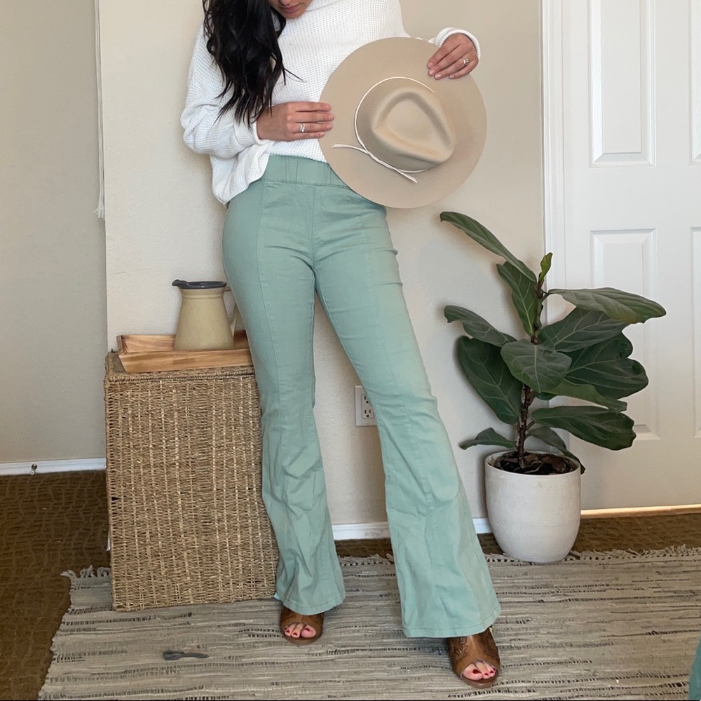 SOLD Green flare jeans size medium